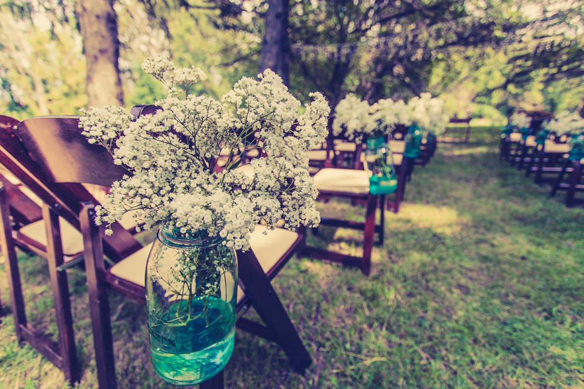 Yorkville IL Chicago Wedding Photography Farm Barn (35) flowers on chairs